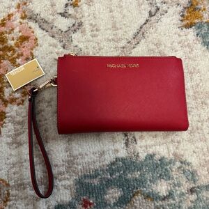 MICHAEL Michael Kors large double-zip wristlet wallet in color “flame”